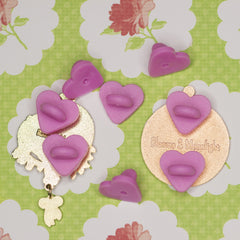 Two pins with heart pinbacks