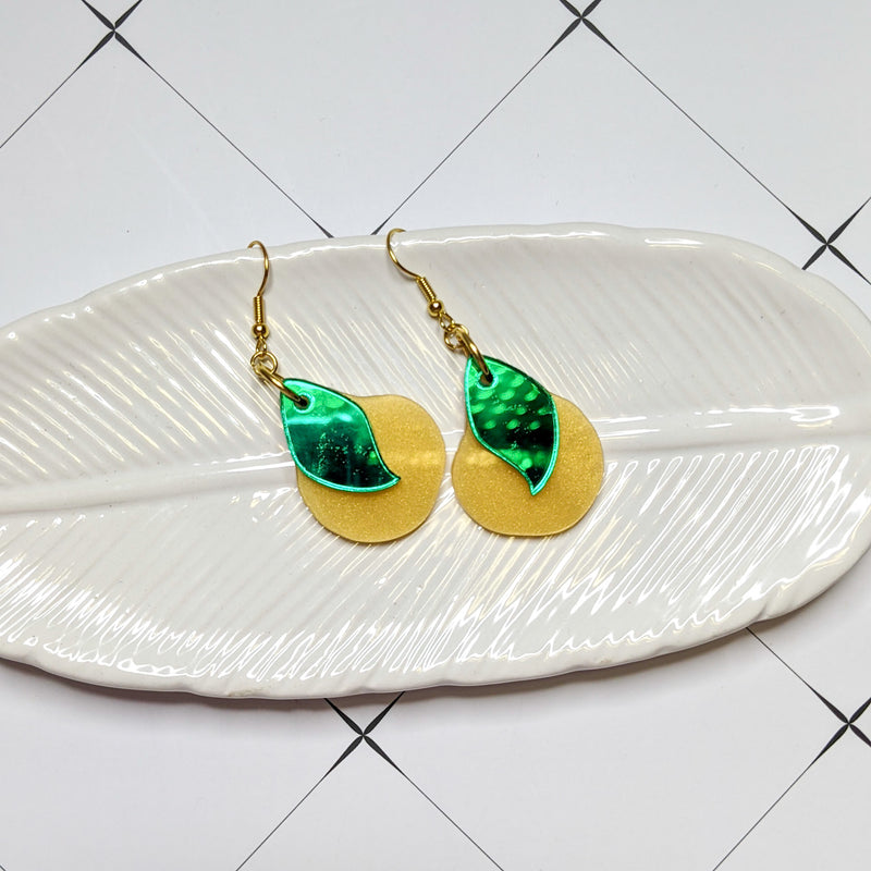 Pear Earrings on a feather dish